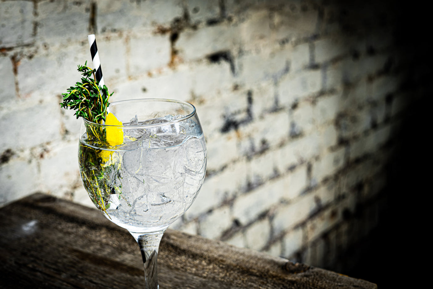 Mediterranean gin cocktail with lemon and fresh thyme 
